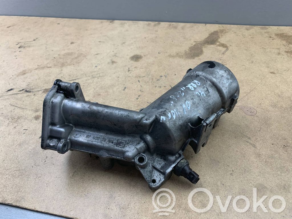 Oil filter mounting bracket   7787072,11427805407,7805407