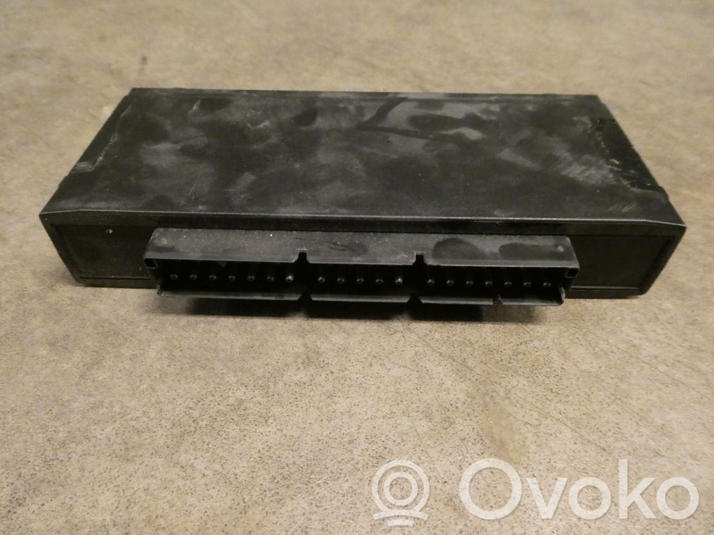 BMW 5 E34 Komforto modulis 