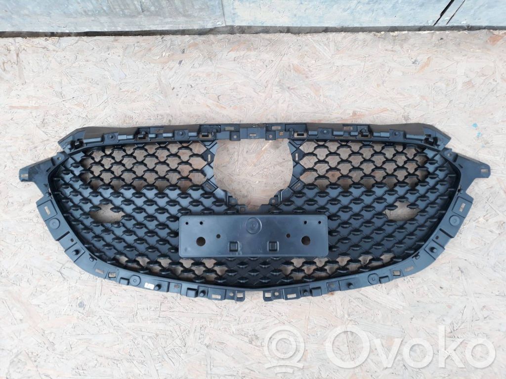 Mazda Demio Front bumper upper radiator grill 