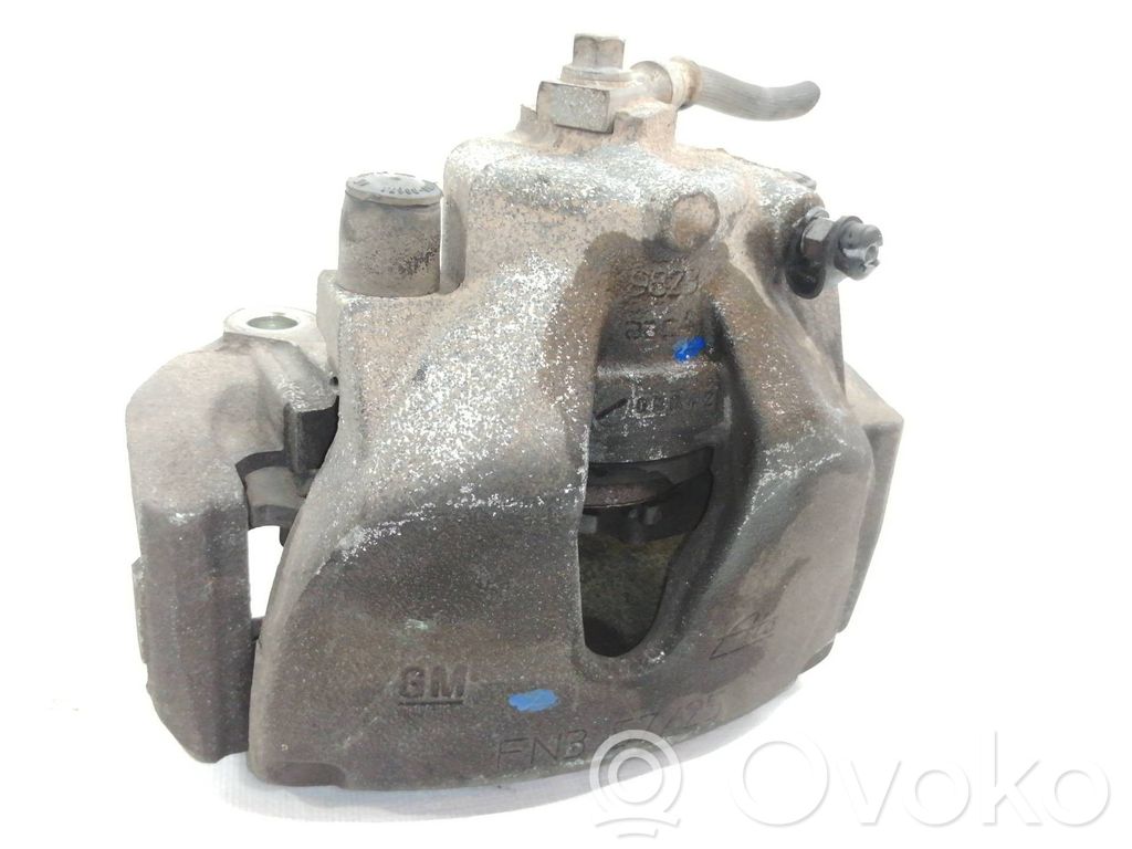 Opel Astra G Zacisk hamulcowy przedni 
