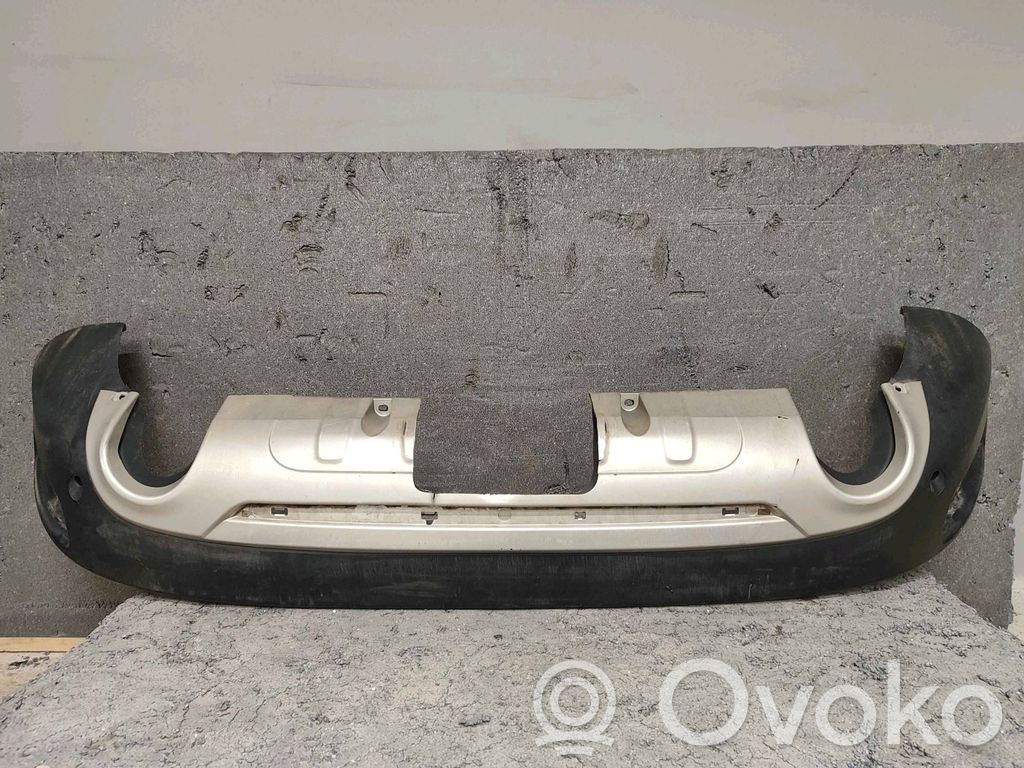 Volvo XC60 Moldura inferior del parachoques trasero 