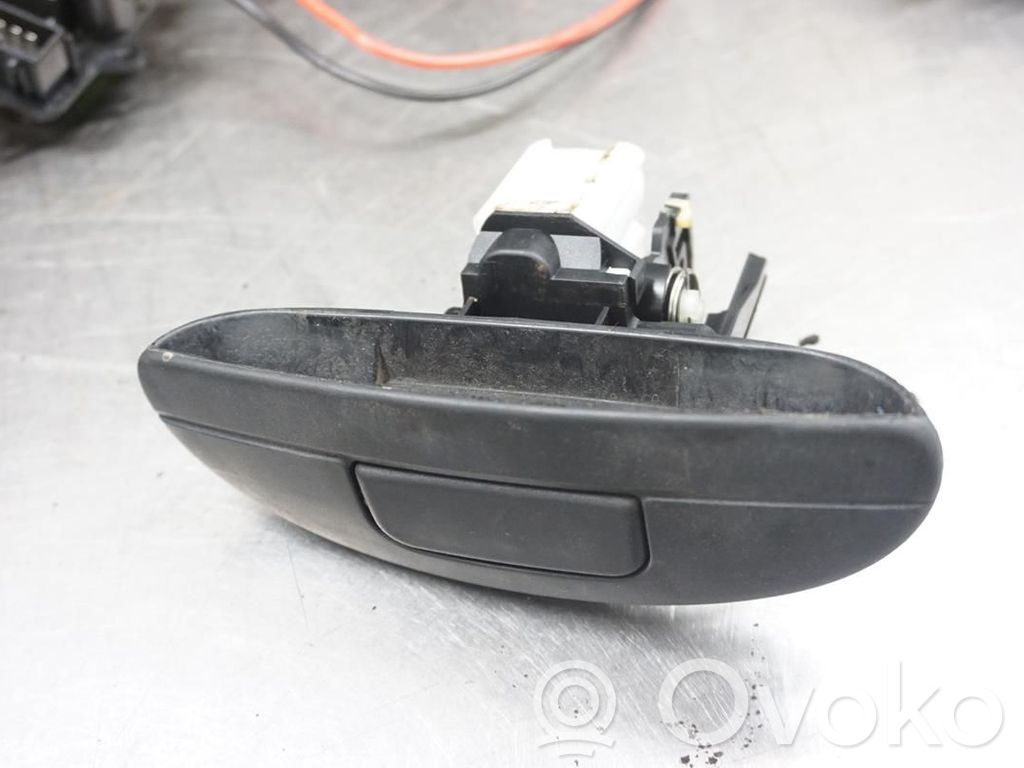 Renault Scenic I Front door lock (next to the handle) 