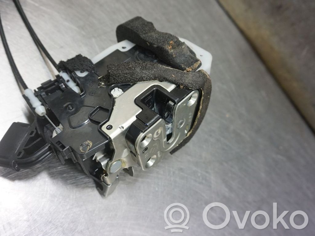 Nissan Juke I F15 Zamek drzwi przednich 