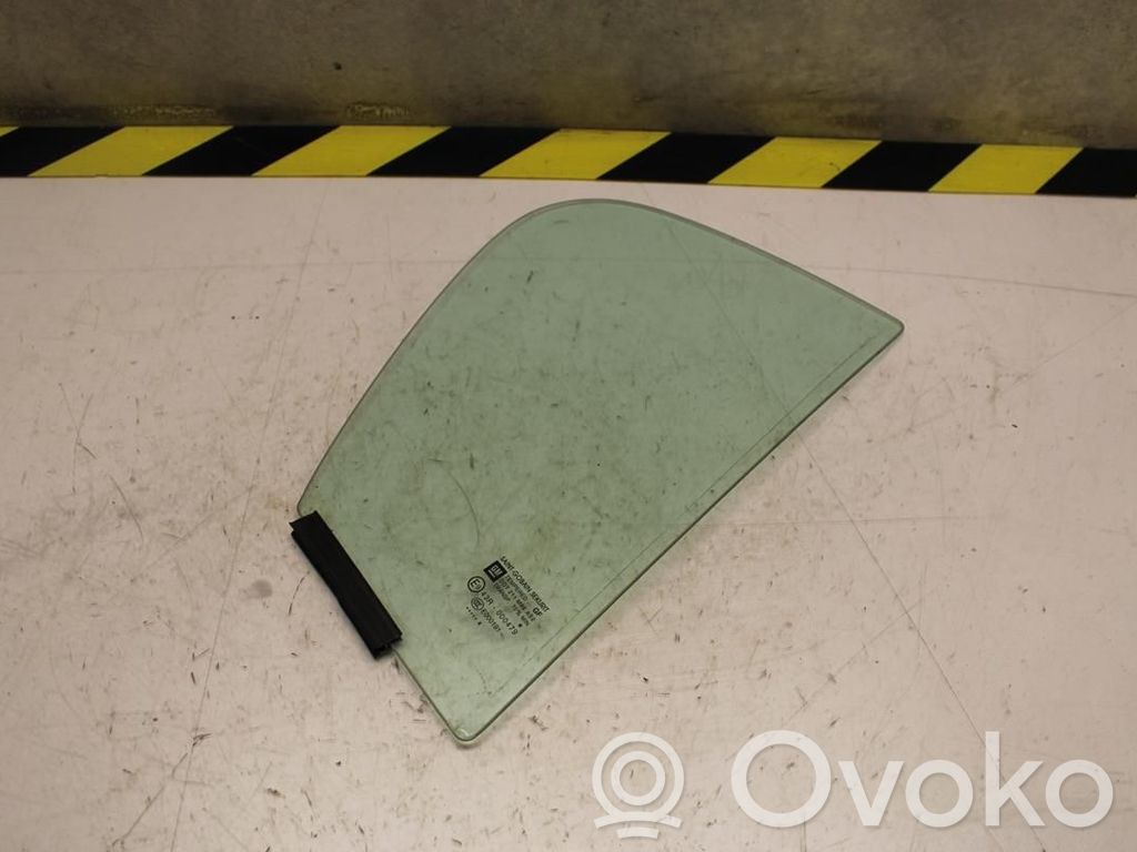 Opel Corsa D Ventanilla de ventilación de la puerta trasera 