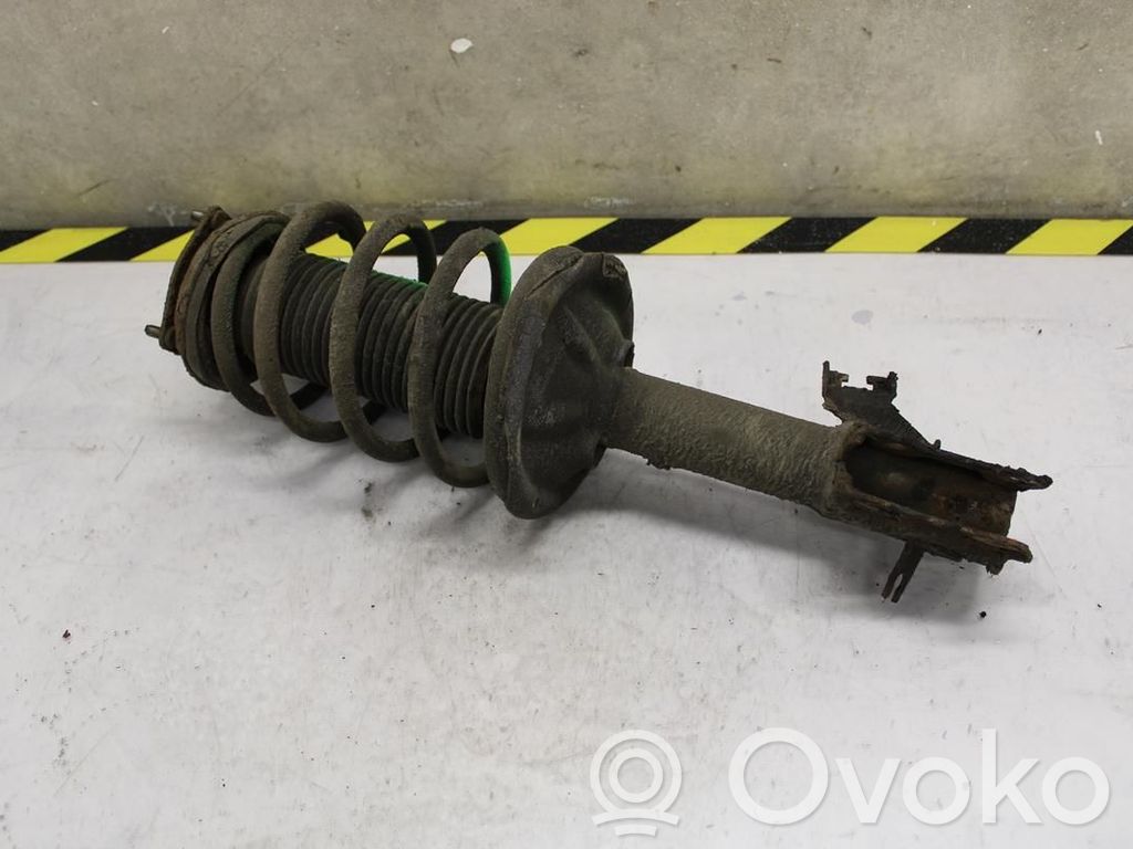 Nissan Almera N16 Amortyzator osi przedniej ze sprężyną 