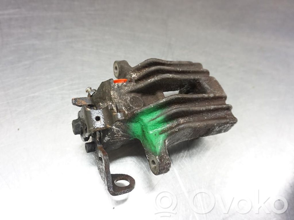 Volkswagen Golf IV Tylny zacisk hamulcowy 