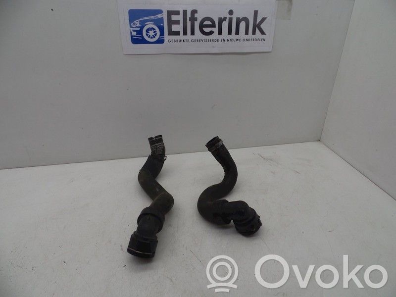 Opel Corsa D Engine coolant pipe/hose 