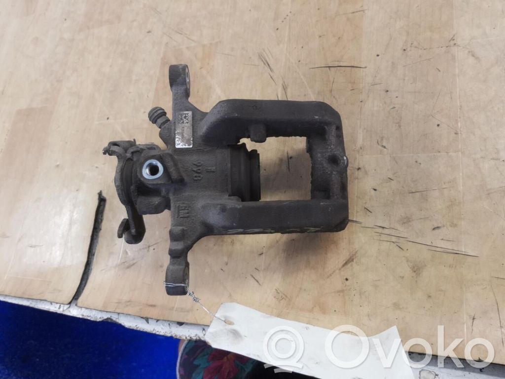Opel Astra J Tylny zacisk hamulcowy 
