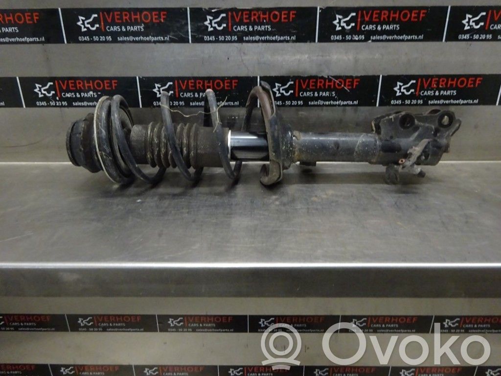 Front shock absorber with coil spring
