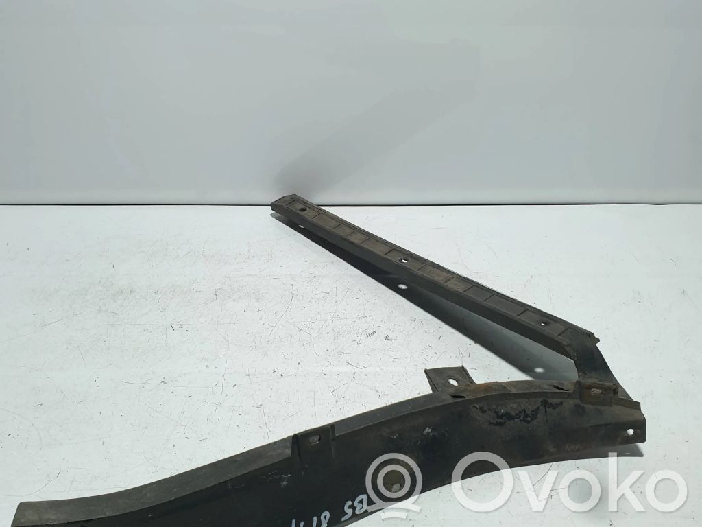 Volkswagen PASSAT B5 Uchwyt / Mocowanie zderzaka tylnego 