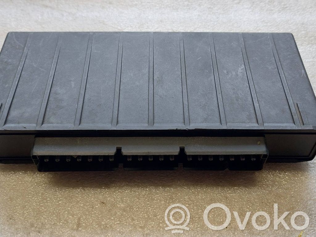 BMW 5 E34 Komforto modulis 