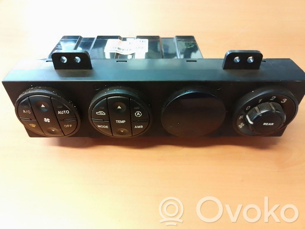 KIA Carens II Moldura del climatizador/control de calefacción 