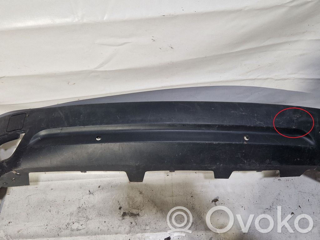 Renault Megane III Moldura inferior del parachoques trasero 