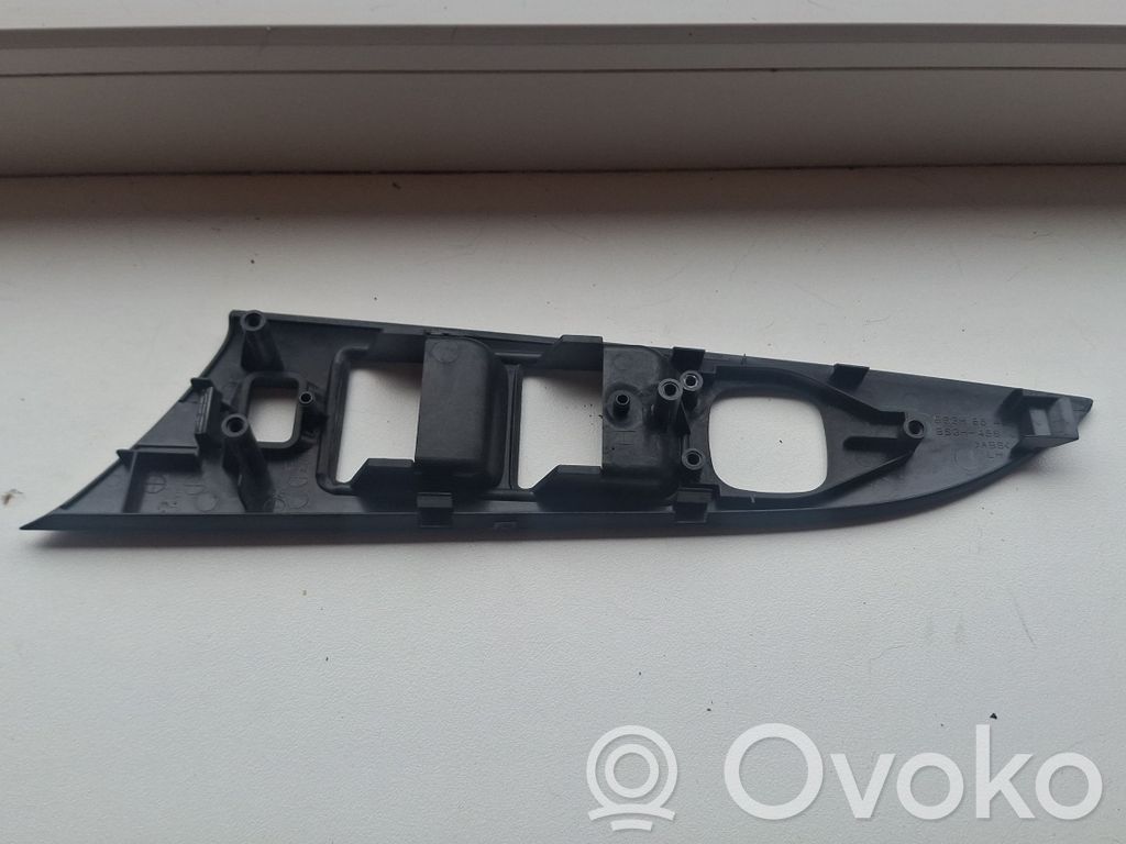 Mazda 3 I Front door window switch trim 