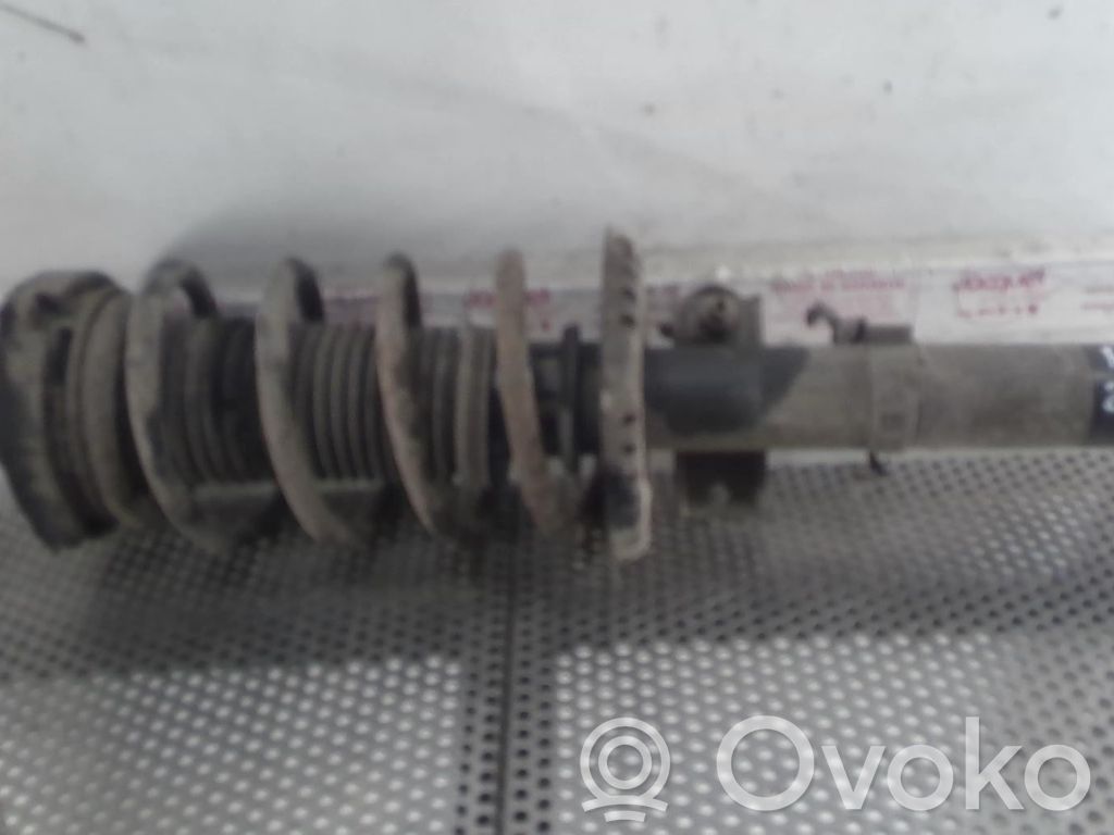 Volkswagen Fox Amortyzator osi przedniej ze sprężyną 