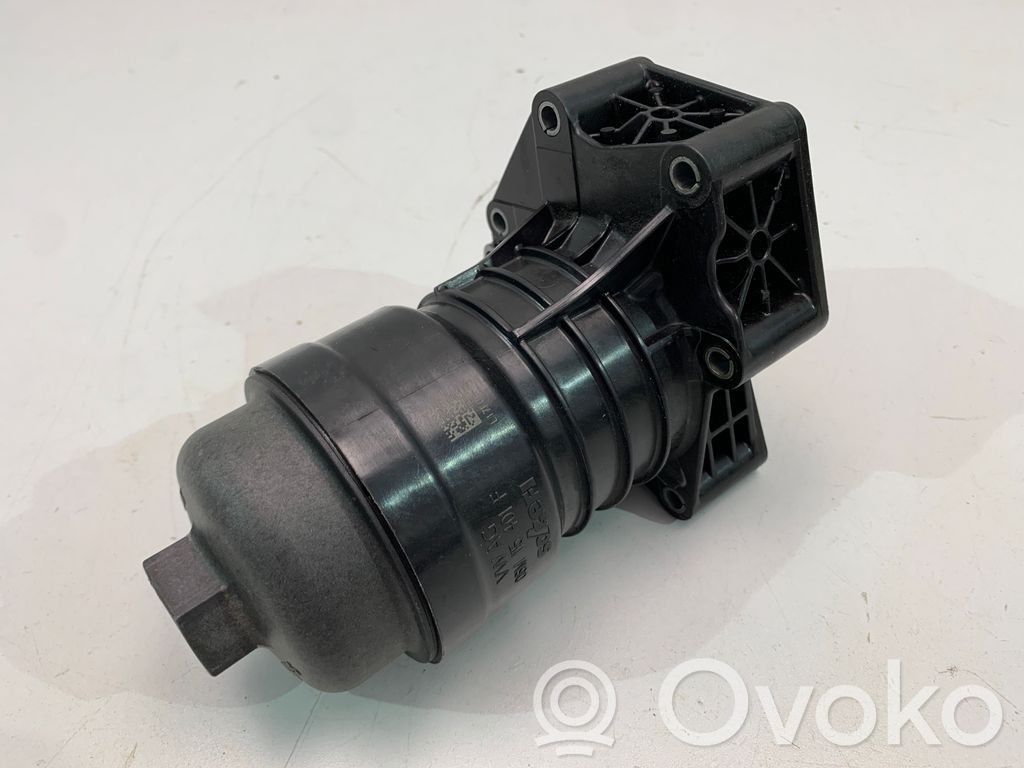 Oil filter mounting bracket   06M115401F