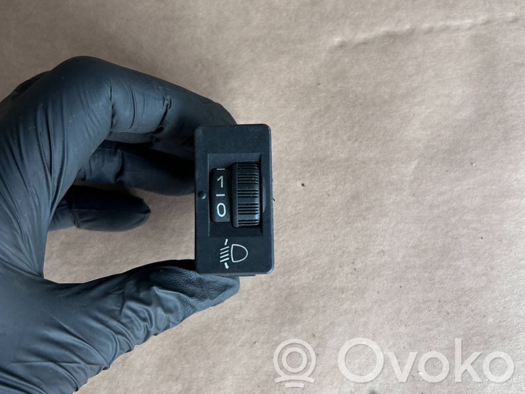 Headlight level height control switch
