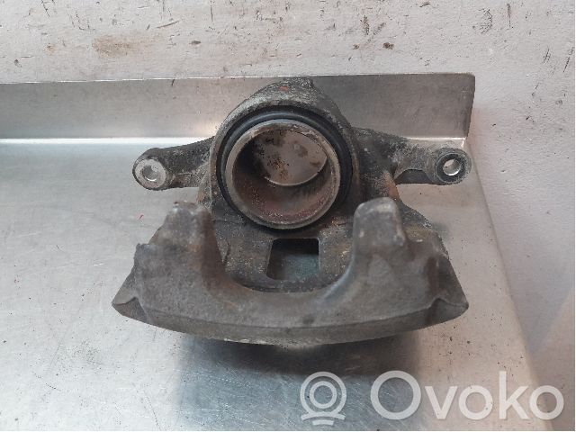 Toyota Corolla E210 E21 Zacisk hamulcowy przedni 