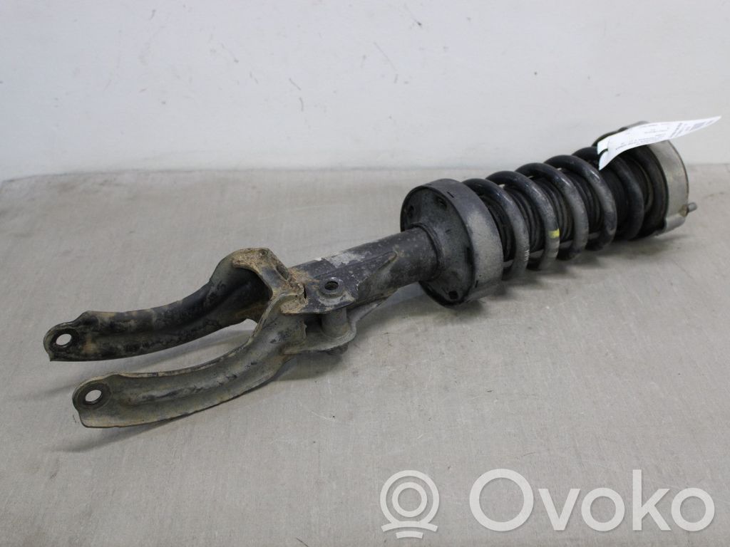 Volkswagen Touareg II Front shock absorber with coil spring 