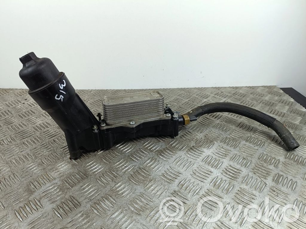 Oil filter mounting bracket   6790424411A3,1E006649