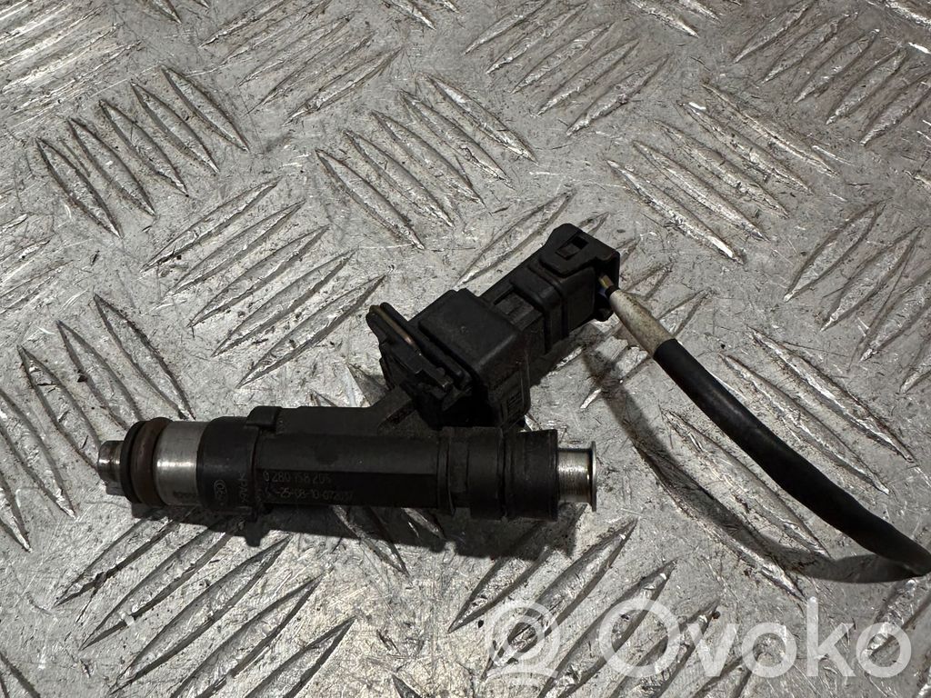 Opel Astra J Inyector de combustible 