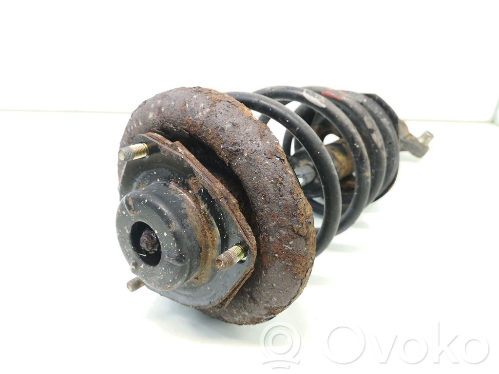 Nissan Primera Amortyzator osi przedniej ze sprężyną 