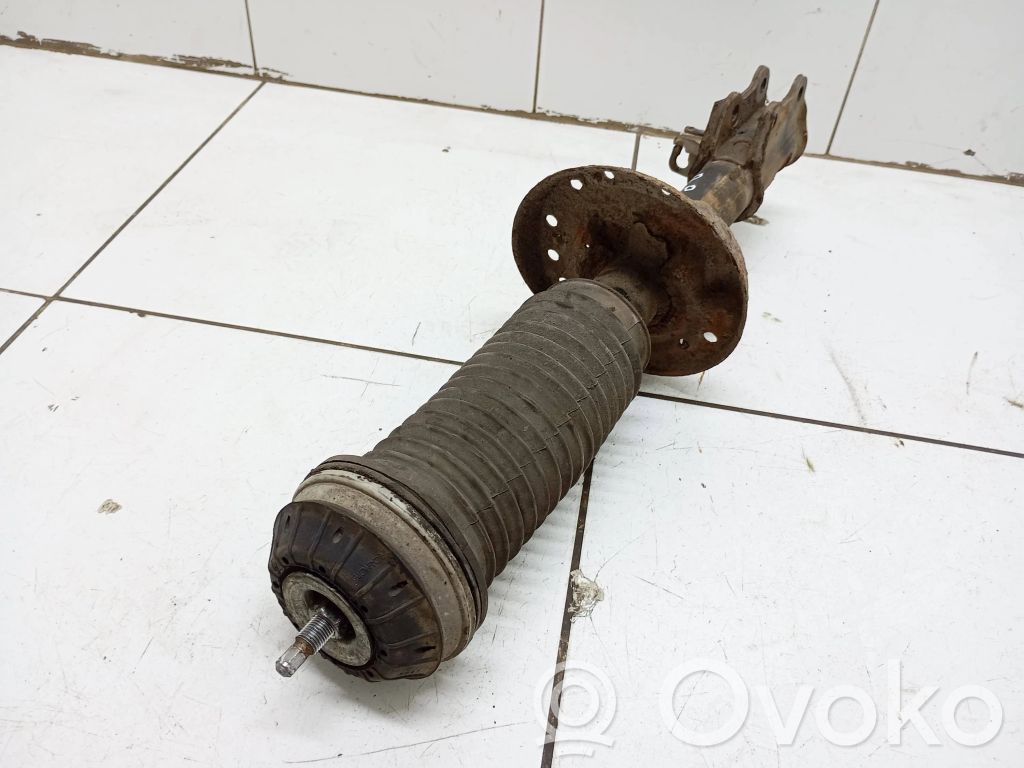 Opel Corsa D Priekšpusē amortizators 