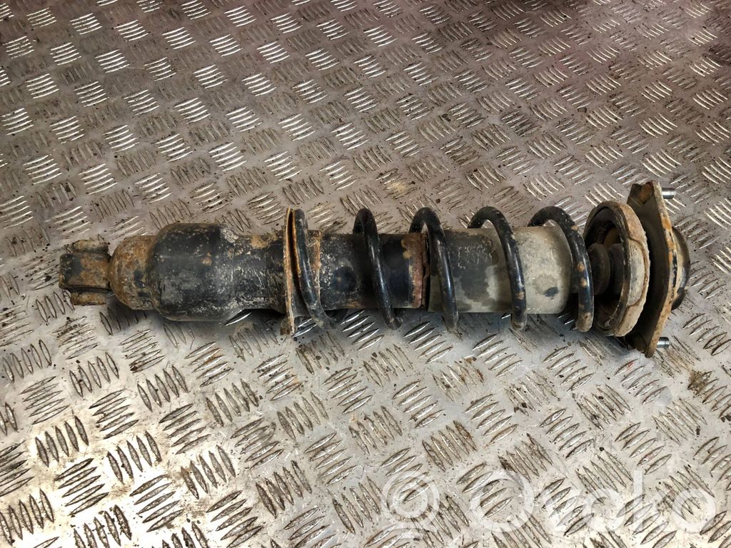 Subaru Outback Takaiskunvaimennin kierrejousella 