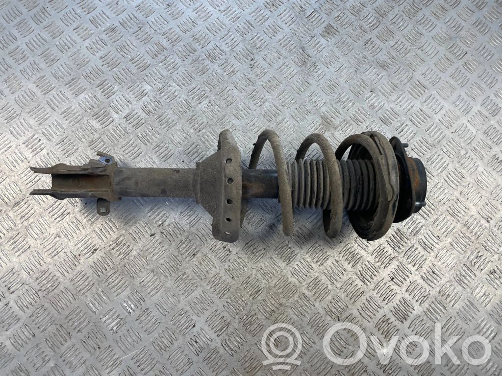 Front shock absorber with coil spring