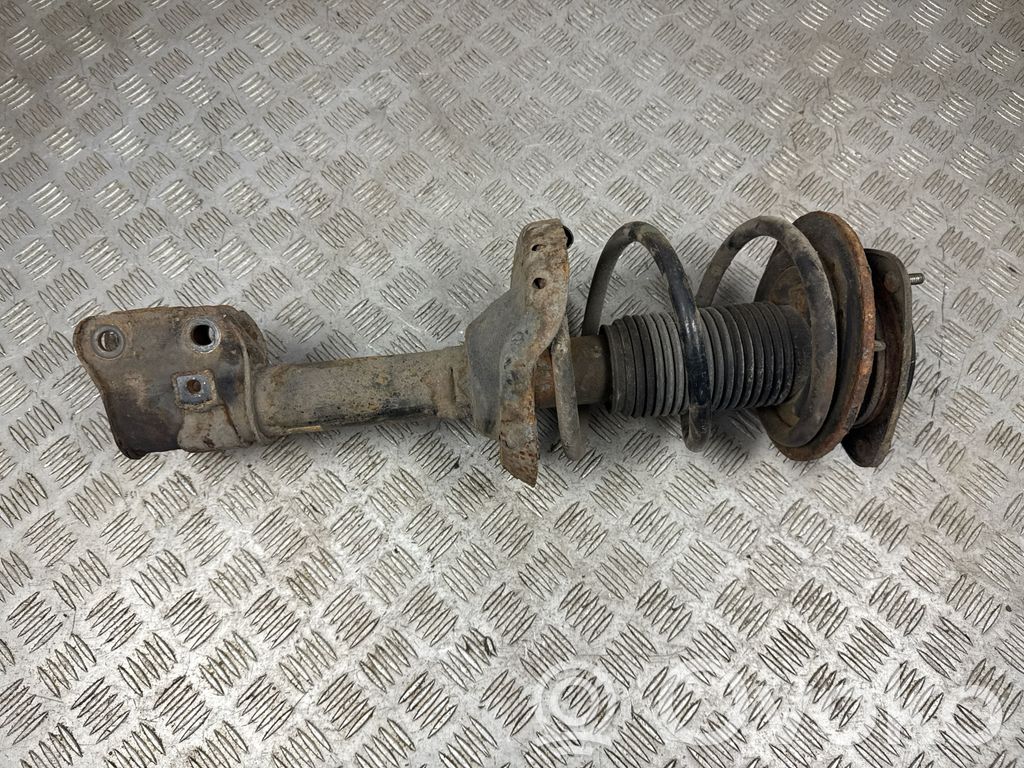 Subaru Outback Front shock absorber with coil spring 
