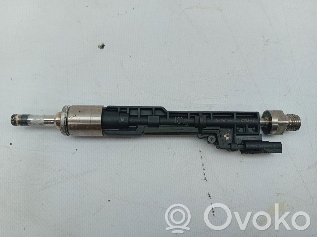 Inyector de combustible   7639994