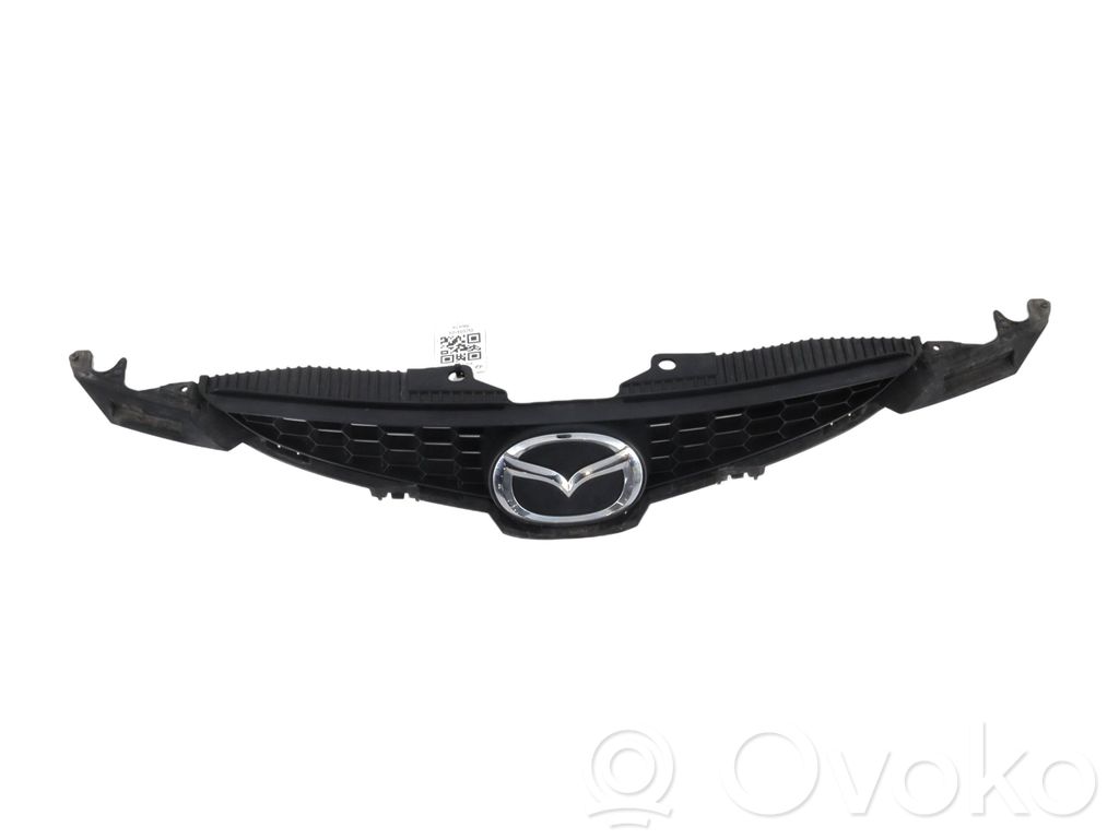 Mazda 2 Front bumper upper radiator grill 