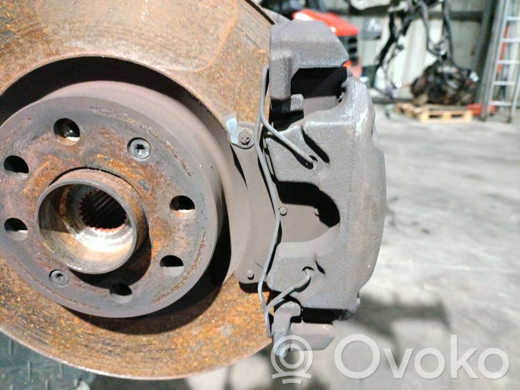Opel Corsa E Front brake caliper 