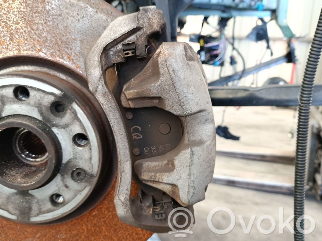 Peugeot 308 Zacisk hamulcowy przedni 
