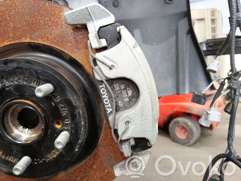 Toyota Yaris Zacisk hamulcowy przedni 