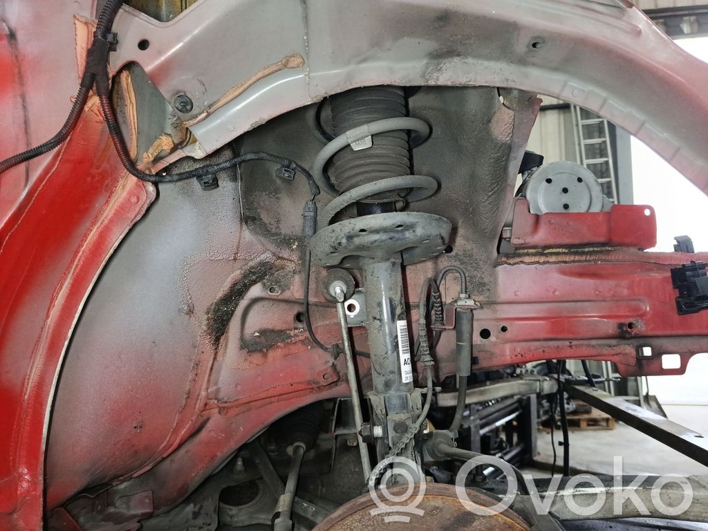 Opel Corsa E Priekšpusē amortizators ar atsperi 