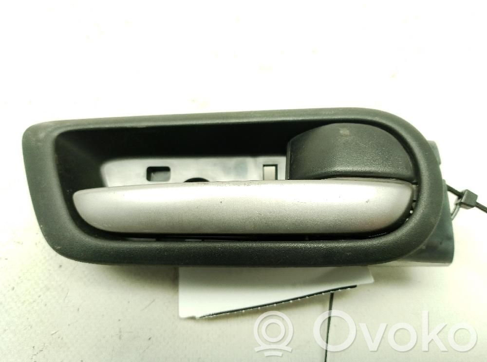 Manecilla interna puerta delantera