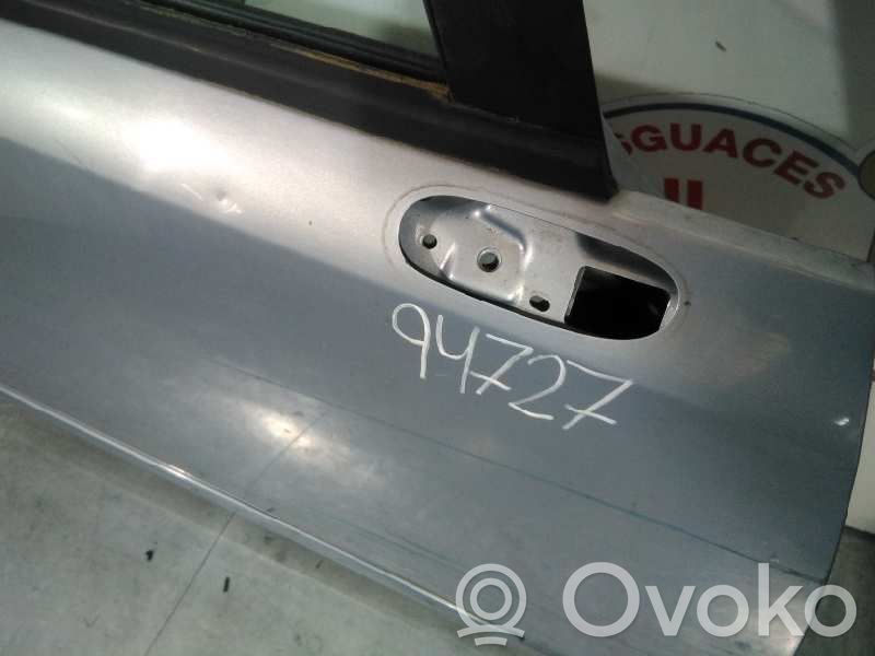 Opel Corsa D Drzwi przednie 