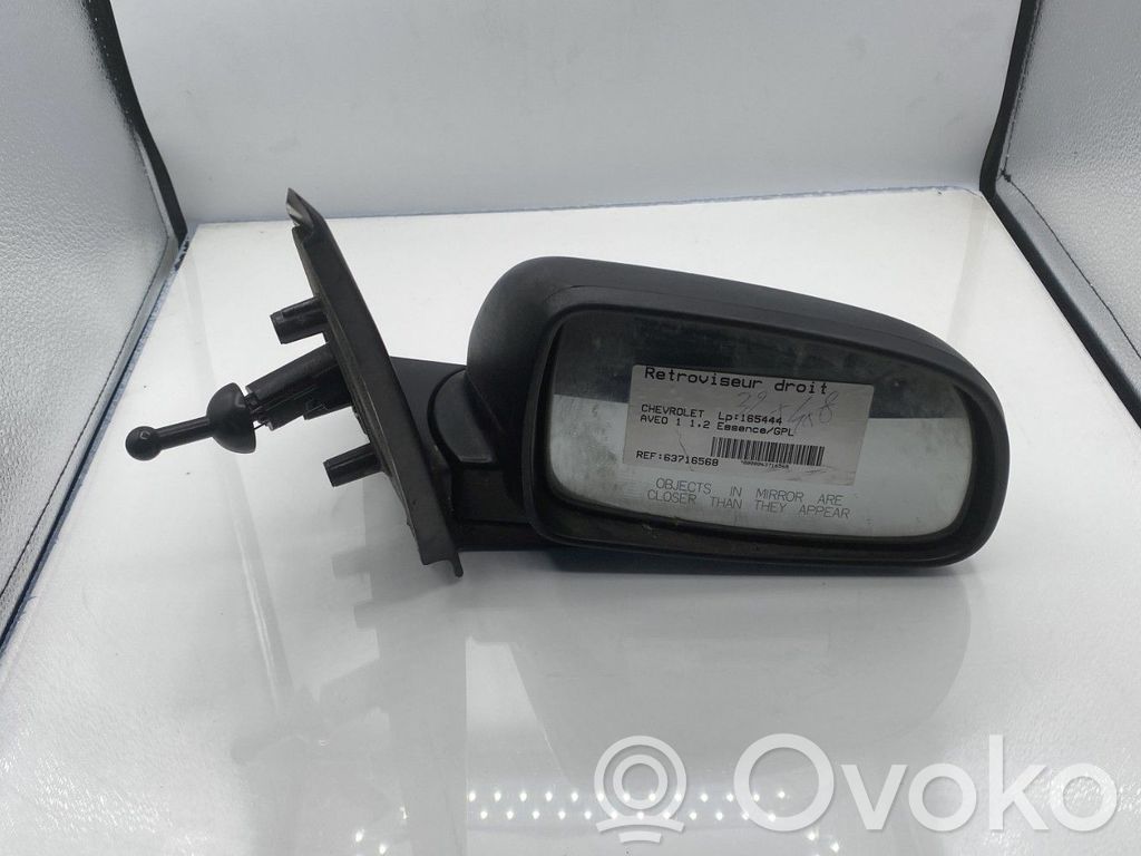 Chevrolet Aveo Espejo lateral manual 