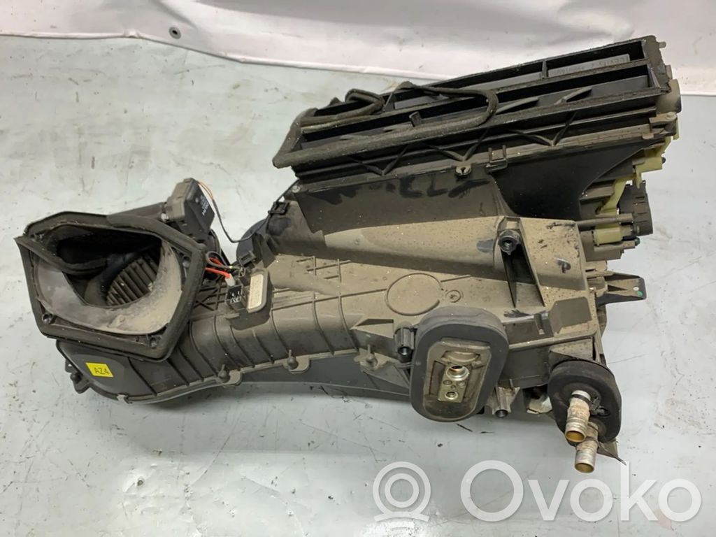 Opel Astra H Montaje de la caja de climatización interior 