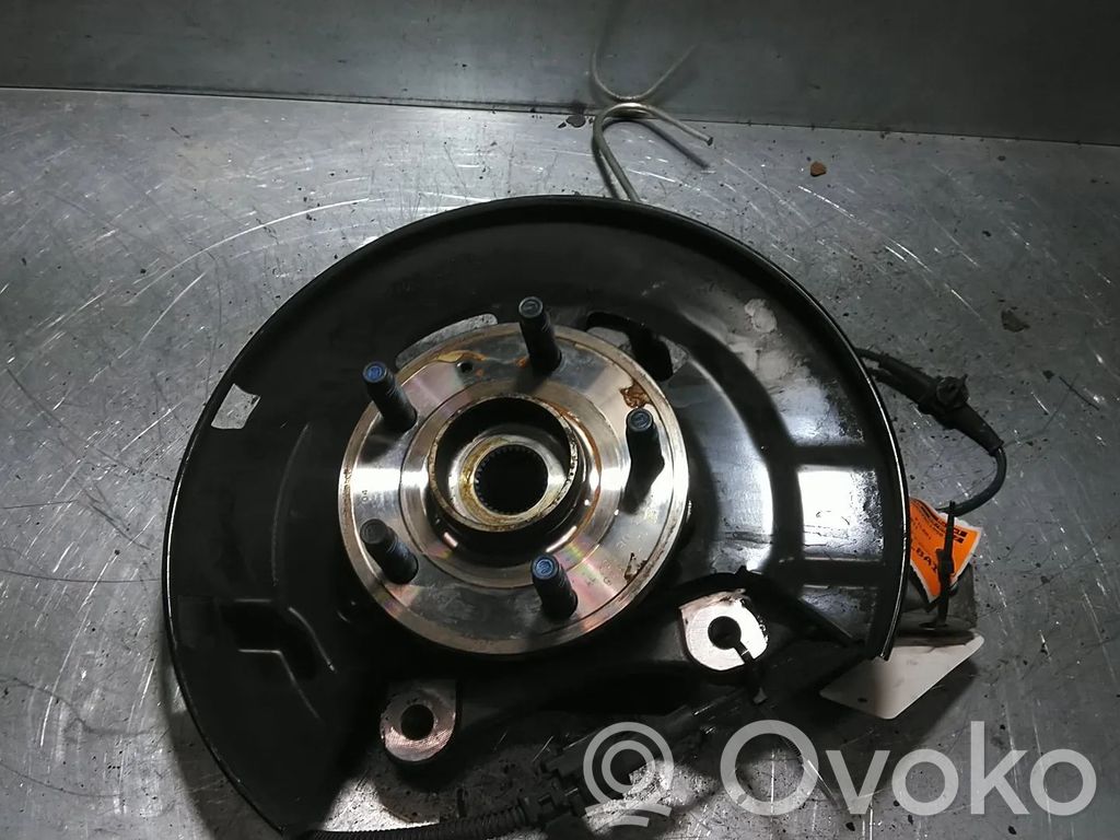 Opel Astra J Zwrotnica koła przedniego 