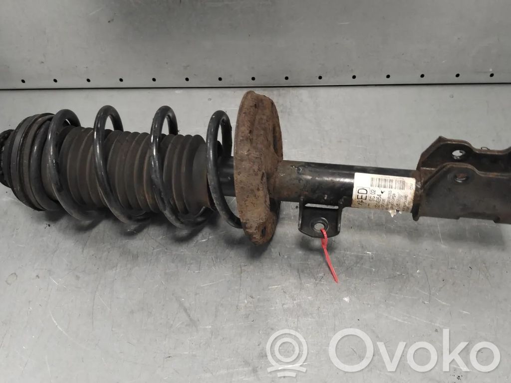 Opel Corsa D Amortyzator przedni 