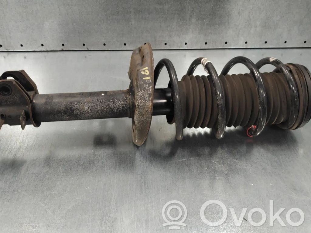 Opel Corsa D Amortyzator przedni 