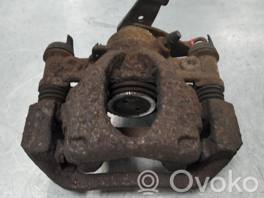 Opel Movano B Tylny zacisk hamulcowy 