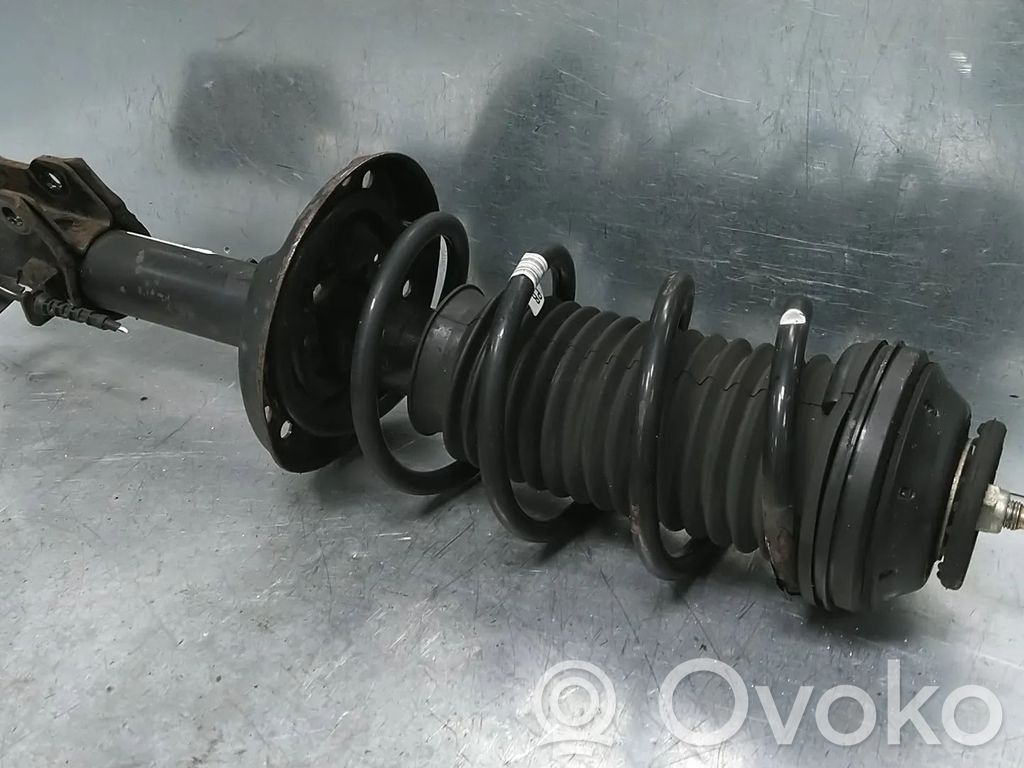 Opel Corsa D Amortyzator przedni 