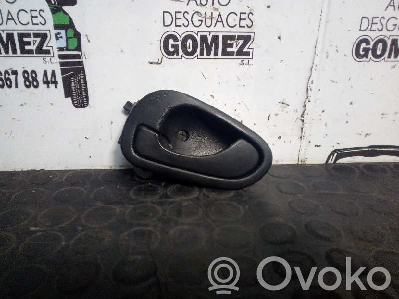 Mitsubishi Carisma Manecilla interna puerta delantera 