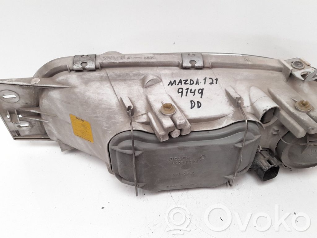 Mazda 121 SM Priekinis žibintas 