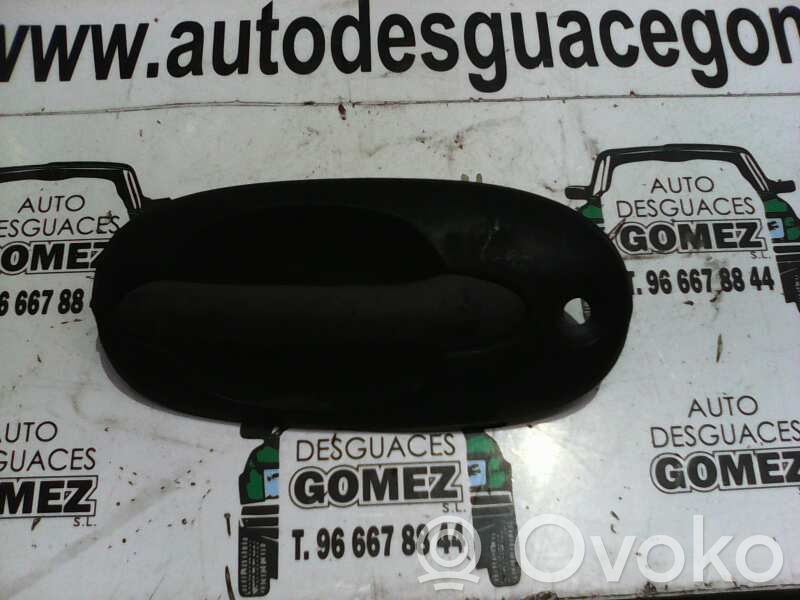 KIA Carnival Manecilla externa puerta delantera