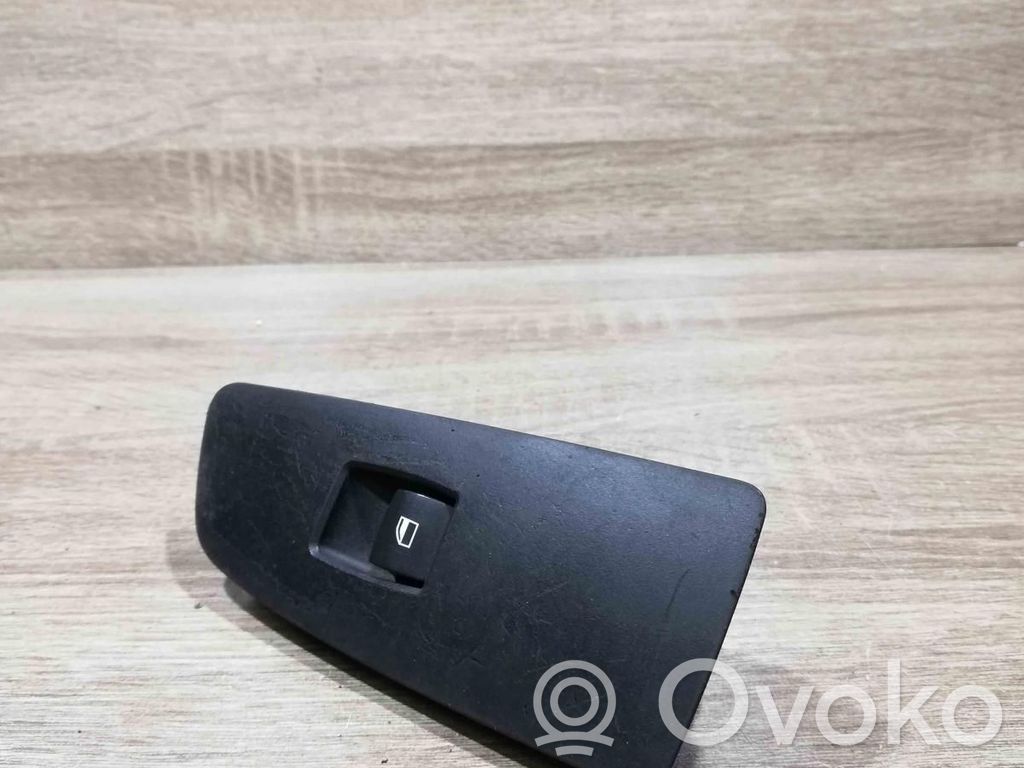 Electric window control switch   6935534,15979800