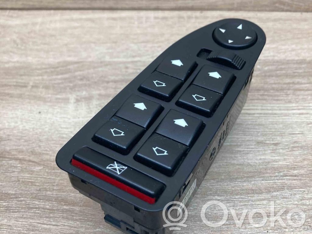 Electric window control switch   6904306,817447